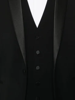Abito nero con giacca e pantaloni