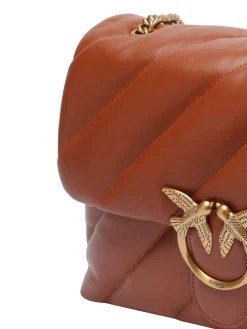 Adoro la classica borsa a tracolla puffer