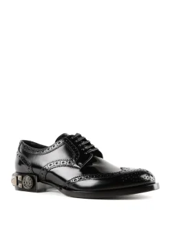 Brogue con tacco borchiato