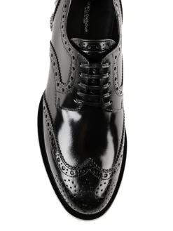 Brogue con tacco borchiato