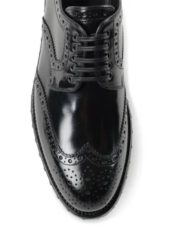 Brogue in pelle con borchiette