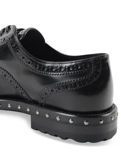 Brogue in pelle con borchiette