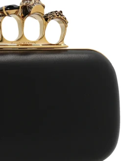 Clutch con teschio e anelli