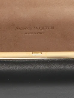 Clutch con teschio e anelli