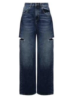 Dettagli ritagliati dei jeans di papavero