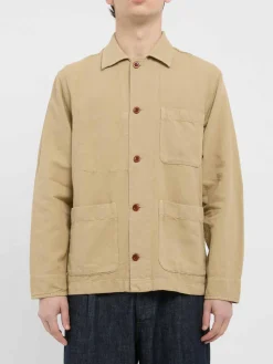 Giacca beige in cotone con bottoni e tasche
