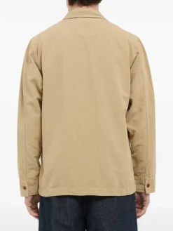 Giacca beige in cotone con bottoni e tasche