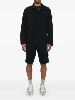 Giacca nera con manica a logo patch