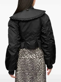 Giacca nera con tasca con zip manica