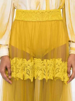 Gonna midi giallo ocra con pannelli in pizzo