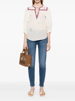 Jeans di denim blu gamba sottili