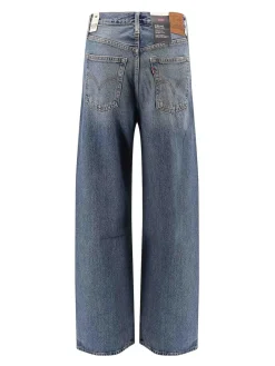 Jeans gamba larga con cassa toracica