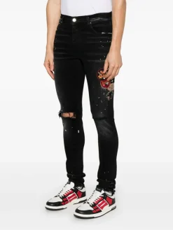 Jeans magri con patch