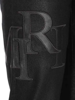 Jeans magri logo