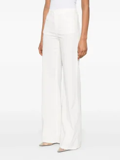 Jeans svasati in denim bianco