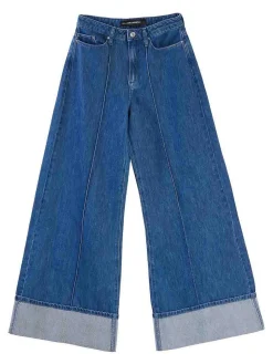 Pantaloni in denim a gamba larga piegati