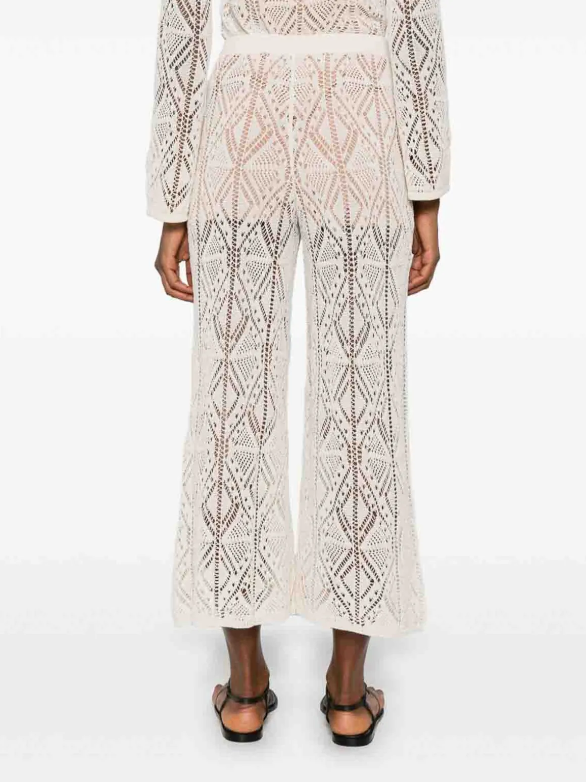 Pantaloni perforati