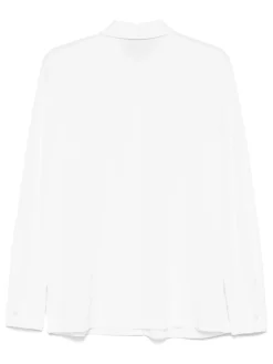 Polo bianco con bottoni