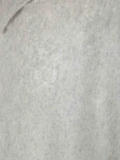 Poncho lavorato a maglia aperto