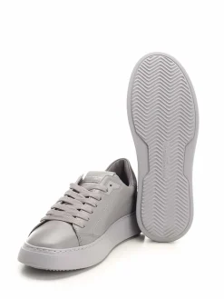 Sneaker grigie a bassa cima