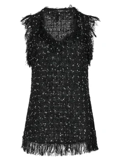 Top a polka ricamato nero