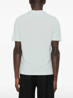 T-shirt della maglia verde Aqua