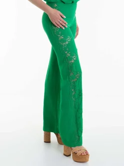 Tuta in pizzo con scollo tondo