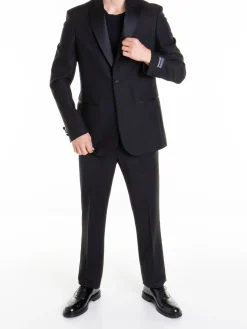 Vestito con risvolto dentellato